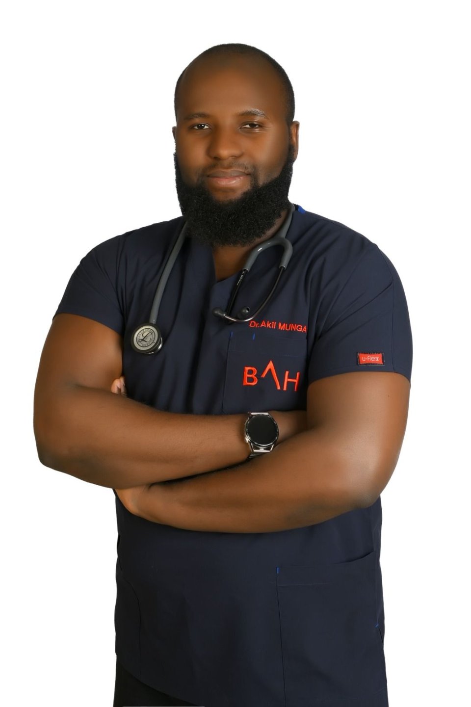 Dr.  Akılı Mrısho Munga
