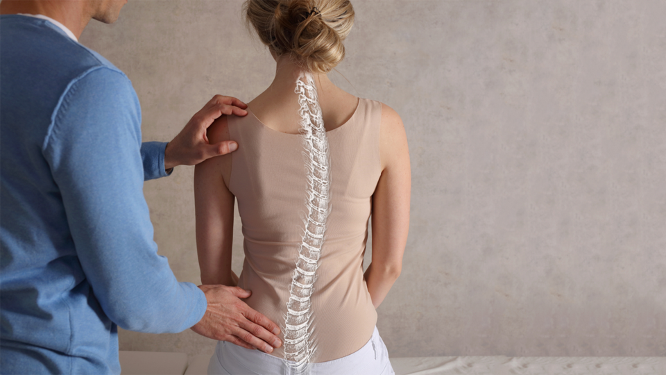 WHAT IS SCOLIOSIS?